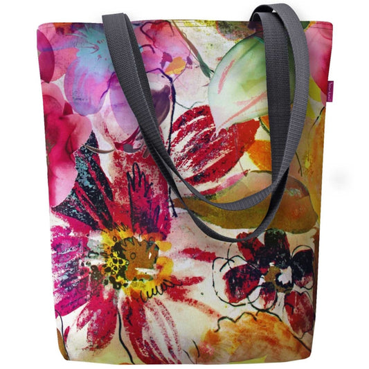 Garden on puutarhateemaan sijoittuva ostoslaukku. Olkalaukussa maalauksen omaisia värikkäitä kukkia ympäri ämpäri laukkua.