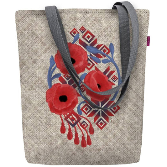 Julia on kuin harmaan-ruskeasta villakankaasta tehty olkalaukku, mutta on kuitenkin teräväpiirrolla toteutettu kukkakuosi-shopperbag.