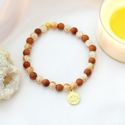 
Goldstone Elastic Bracelet 24K Lotus Flower Charm