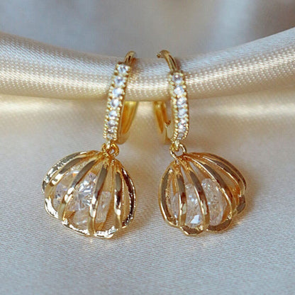 24-karaatin Simpukkakorvikset Zirkoniakivillä Divine Dulcet